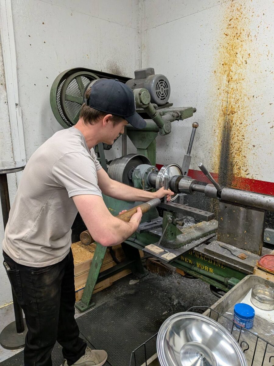 Ben Beard spinning a resonator cone on a vintage lathe